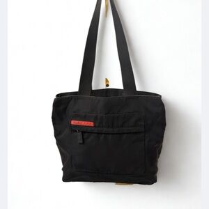 Prada Black Duffel Bag with Red Accent
